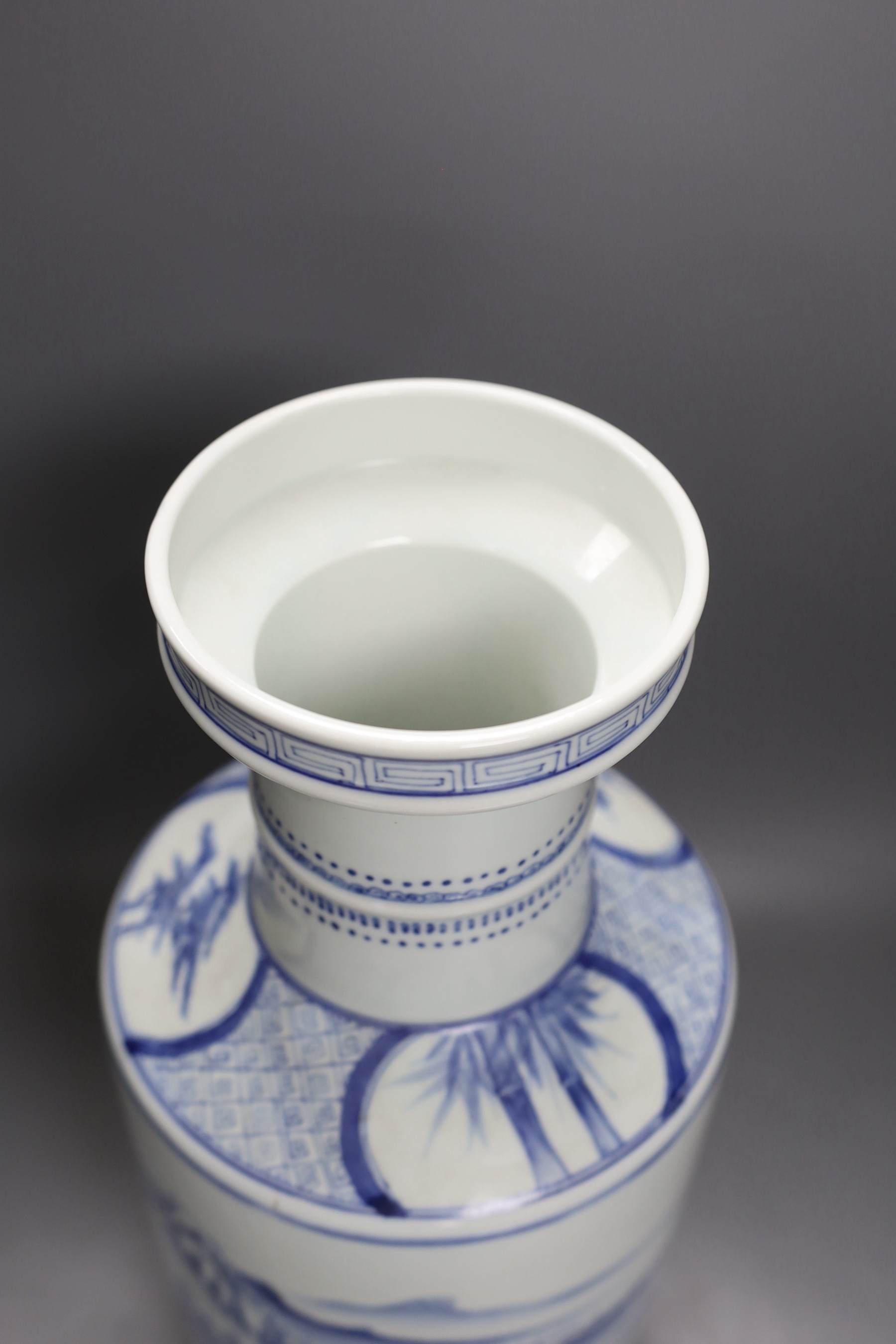 A Chinese blue and white rouleau vase, Kangxi mark but later 40cm